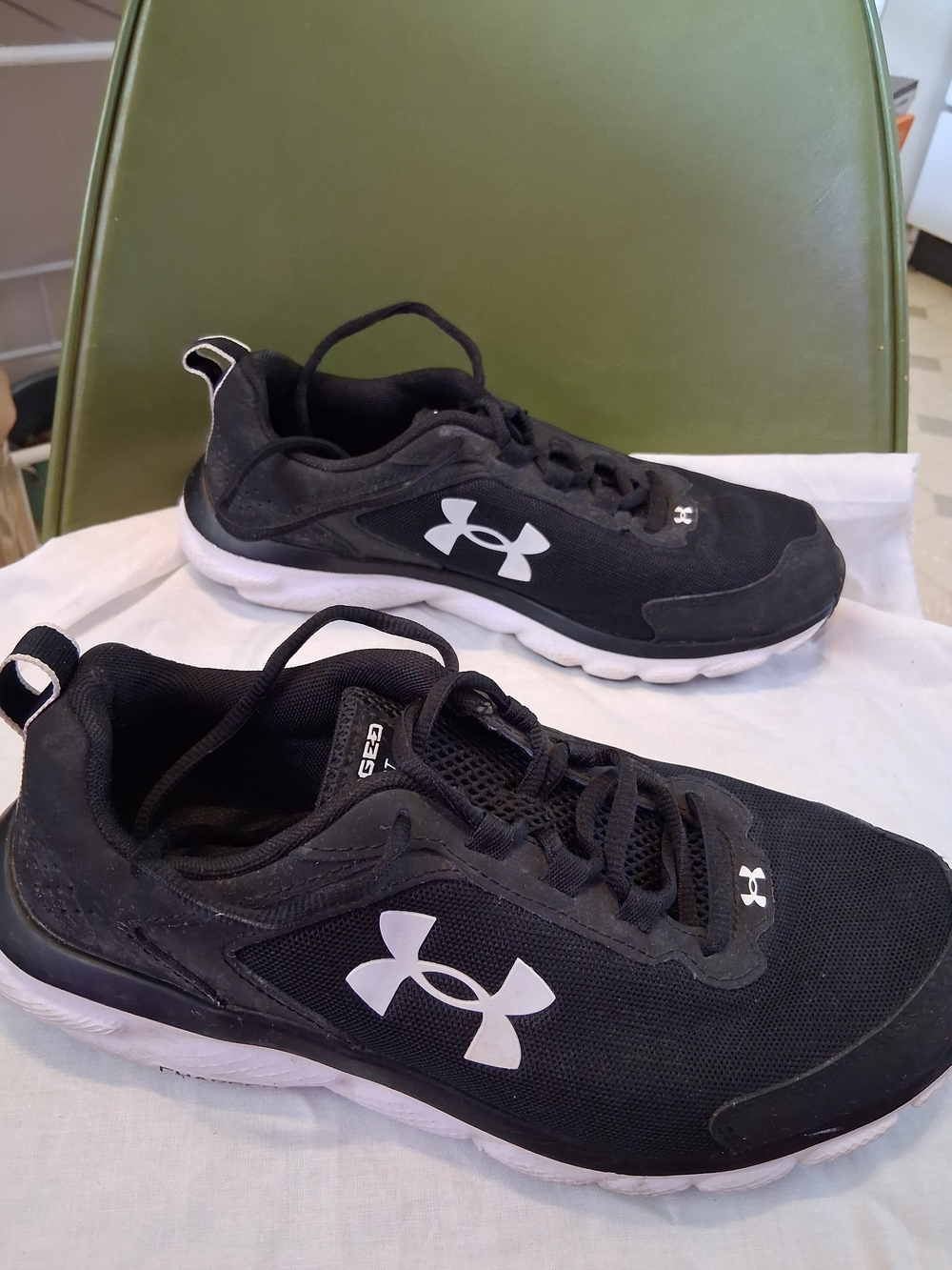 Under Armour Black and White Charged Assert Training Shoes